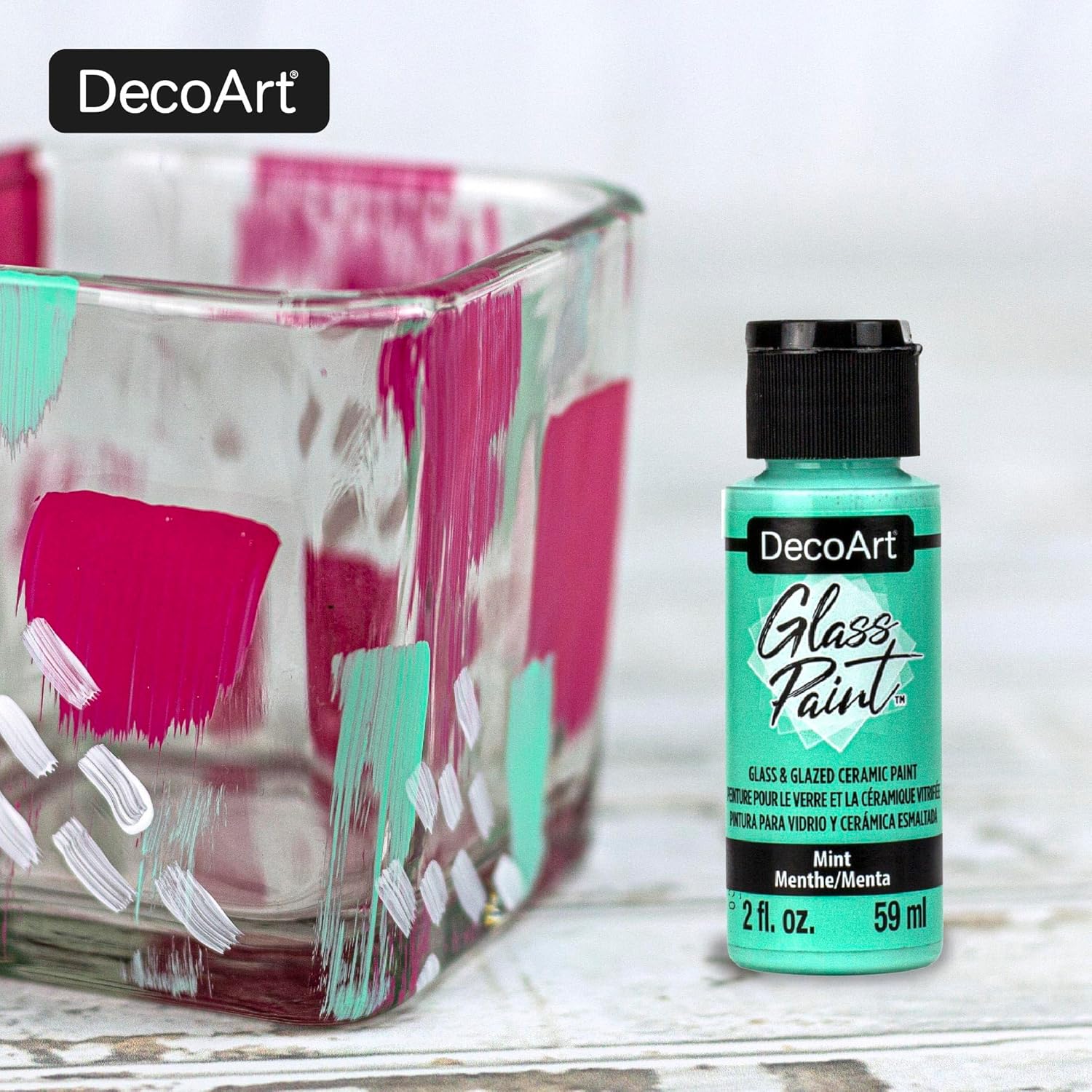 DecoArt glass paint set with 9 opaque colors in 2 fl oz bottles, ideal for glass and ceramic craft projects.
