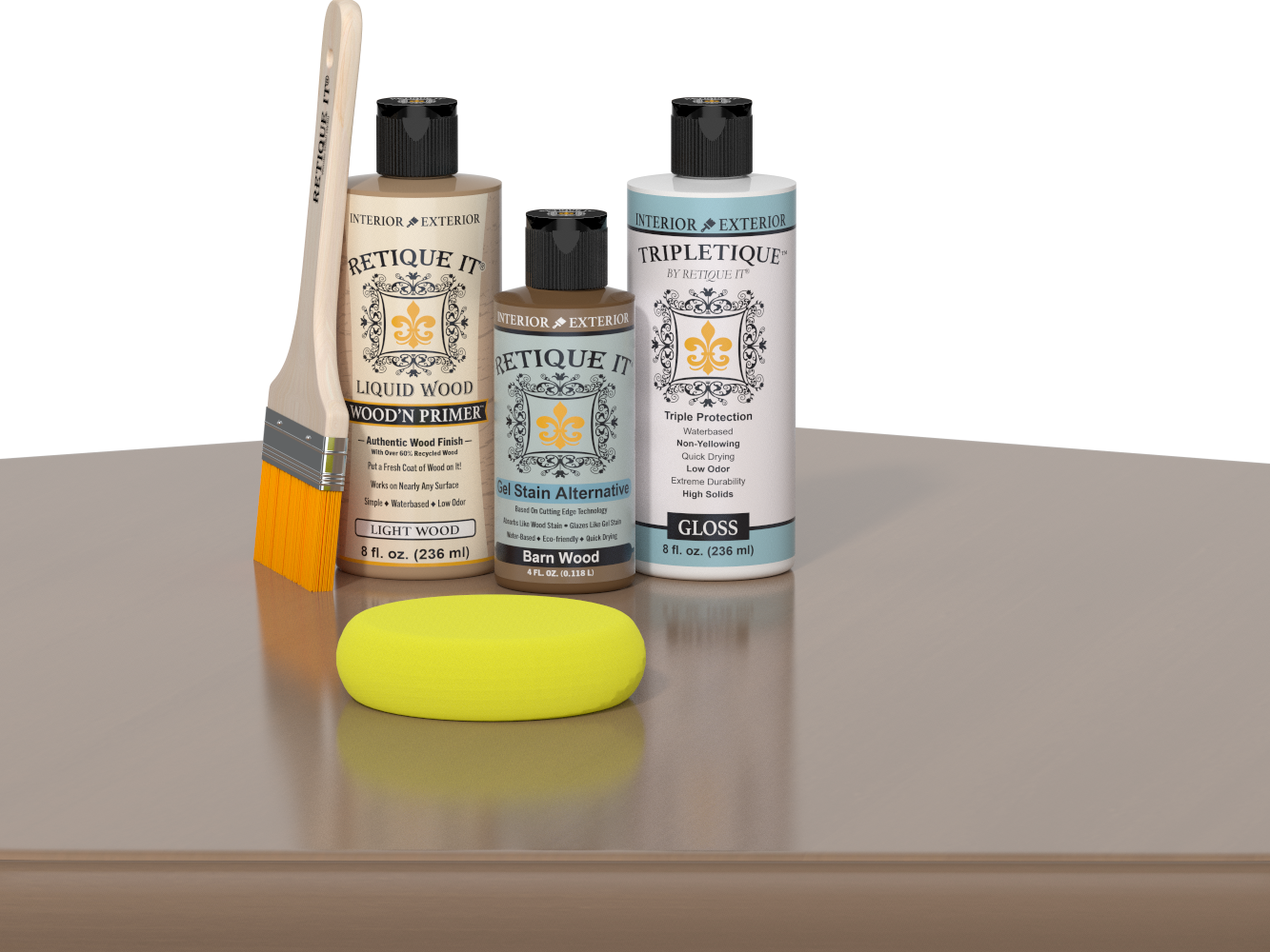 Barn Wood Kit with Light Wood Wood'n Primer, Barn Wood Gel Stain Alternative, Gloss Tripletique topcoat, a paintbrush, and a yellow sponge on a tabletop.