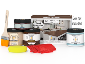 Wood countertop kit with paint cans, a brush, and a box in the background