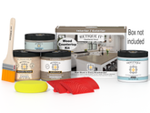 Wood countertop kit with paint cans, a brush, and other tools on a white background