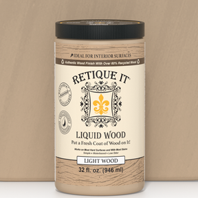 Retique It® Liquid Wood 32oz Light interior paint in a clear bottle showing the light-colored liquid for wood finish.