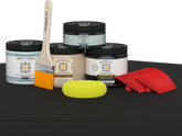 Retique It® Wood'n Kit in classic black for interior wood finishing, shown on a table with a matte black finish.
