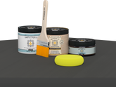 Retique It refinishing kit with Light Wood primer, Charcoal gel stain alternative, matte Tripletique topcoat, a brush and yellow sponge.