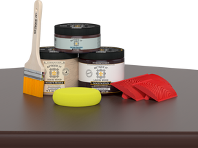 Retique It® Fireplace Wood'n Finish Kit in Red Mahogany stain for full fireplace wood finishing, shown on a table.