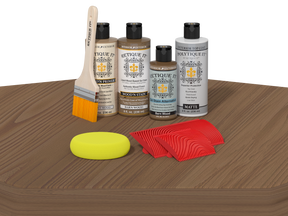 Wood care products including bottles, a brush, a sponge, and cloths on a wooden surface.