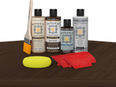 Black Walnut Wood'n Finish Kit by Retique It® with exterior top coat on table, showcasing multi-purpose wood finishing tools and supplies.