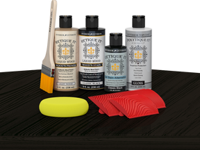 Retique It® Wood'n Finish Kit in Classic Black for exterior wood projects, showing the kit components on a table.