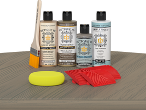 Retique It® Drift Wood Wood'n Kit with Matte TripleTique® includes a brush, Light Wood primer, Drift Wood stain, Weathered Wood Gel Stain Alternative, Matte TripleTique® top coat, a yellow sponge, and a red graining tool.