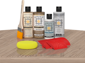 Retique It® Wood'n Finish Kit in French Oak for exterior wood top coating, featuring wood finish and application tools on table.