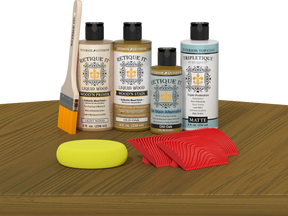 Retique It® Old Oak Wood'n Kit with Light Wood primer, Old Oak stain, Old Oak gel stain alternative, Matte Tripletique® Top Coat, brush, red graining tool, and yellow sponge.