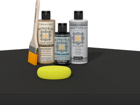 Retique It refinishing kit with Light Wood primer, Classic Black gel stain alternative, matte Polytique It topcoat, a brush and yellow sponge.