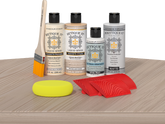 Retique It® Wood'n Finish Kit in Sun Bleached, an exterior top coat with wood finish components on a table.