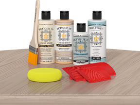 Retique It® Sunbleached Wood'n Kit with Bleached Wood Primer, Pickled Oak Wood'n Stain, Satin TripleTique Top Coat, White Wash Gel Stain Alternative, yellow sponge, red graining tool, and brush.