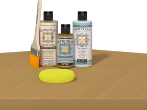 Retique It refinishing kit with Light Wood primer, Old Oak gel stain alternative, matte Tripletique topcoat, a brush and yellow sponge.