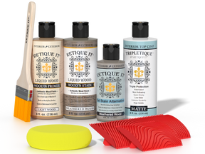 Retique It® Weathered Wood Wood'n Kit with Matte TripleTique® includes a brush, Light Wood primer, Weathered Wood stain, Weathered Wood Gel Stain Alternative, Matte TripleTique® top coat, a yellow sponge, and a red graining tool.