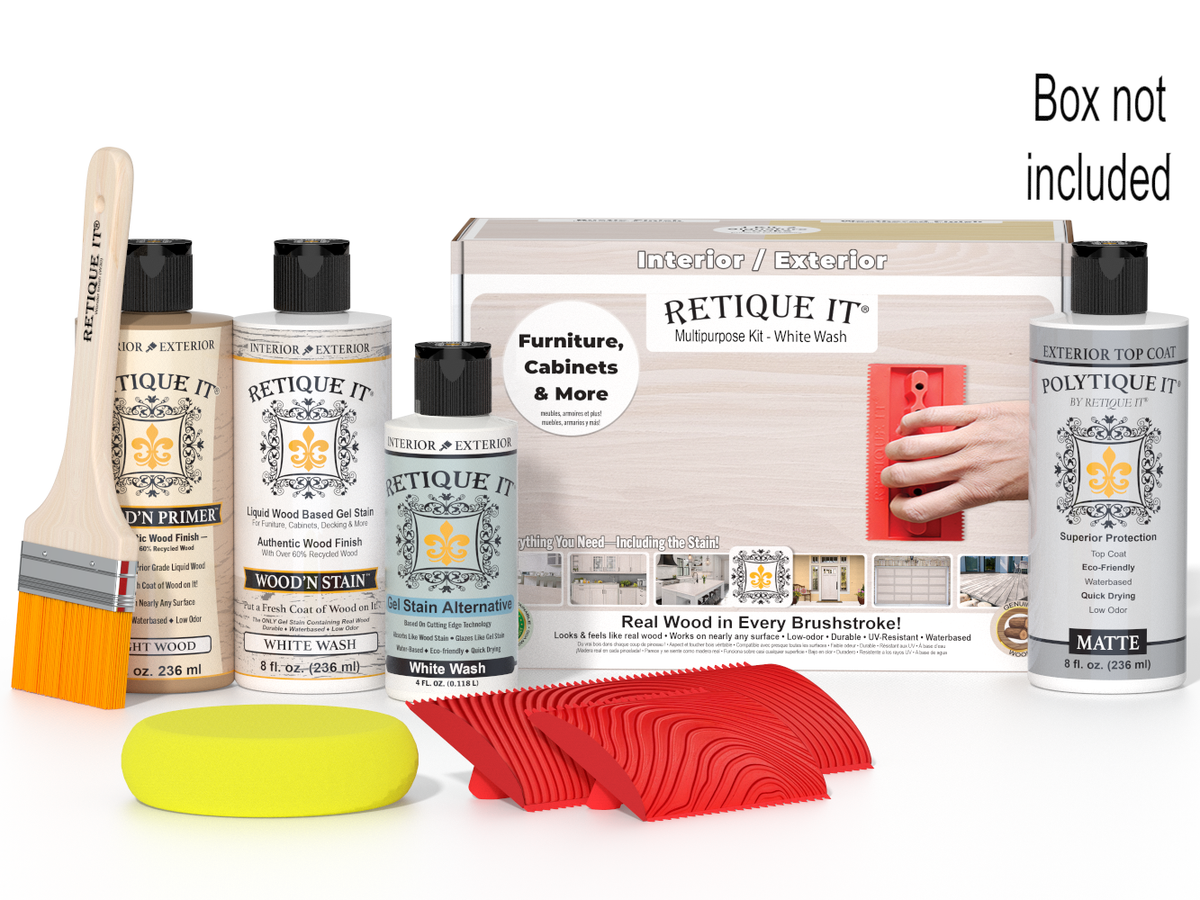 Retique It paint kit with bottles, brush, sponge, and cloth on a white background