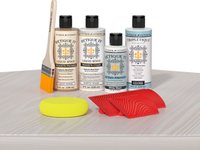 Retique It® Wood'n Finish Kit White Wash stain on a wooden table surface, showcasing the light, whitewashed wood finish.