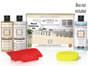 Retique It® Wood'n Finish Kit in White Wash stain, featuring a tabletop with a whitewashed wood finish and stain bottles.