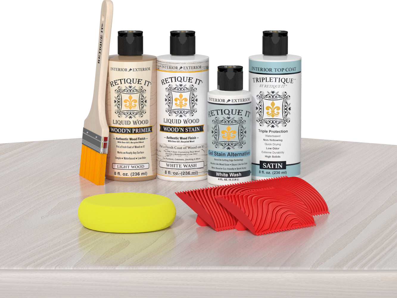 Retique It® White Wash Wood'n Kit with Light Wood primer, White Wash stain, White Wash gel stain alternative, Satin Tripletique® Top Coat, brush, red graining tool, and yellow sponge.