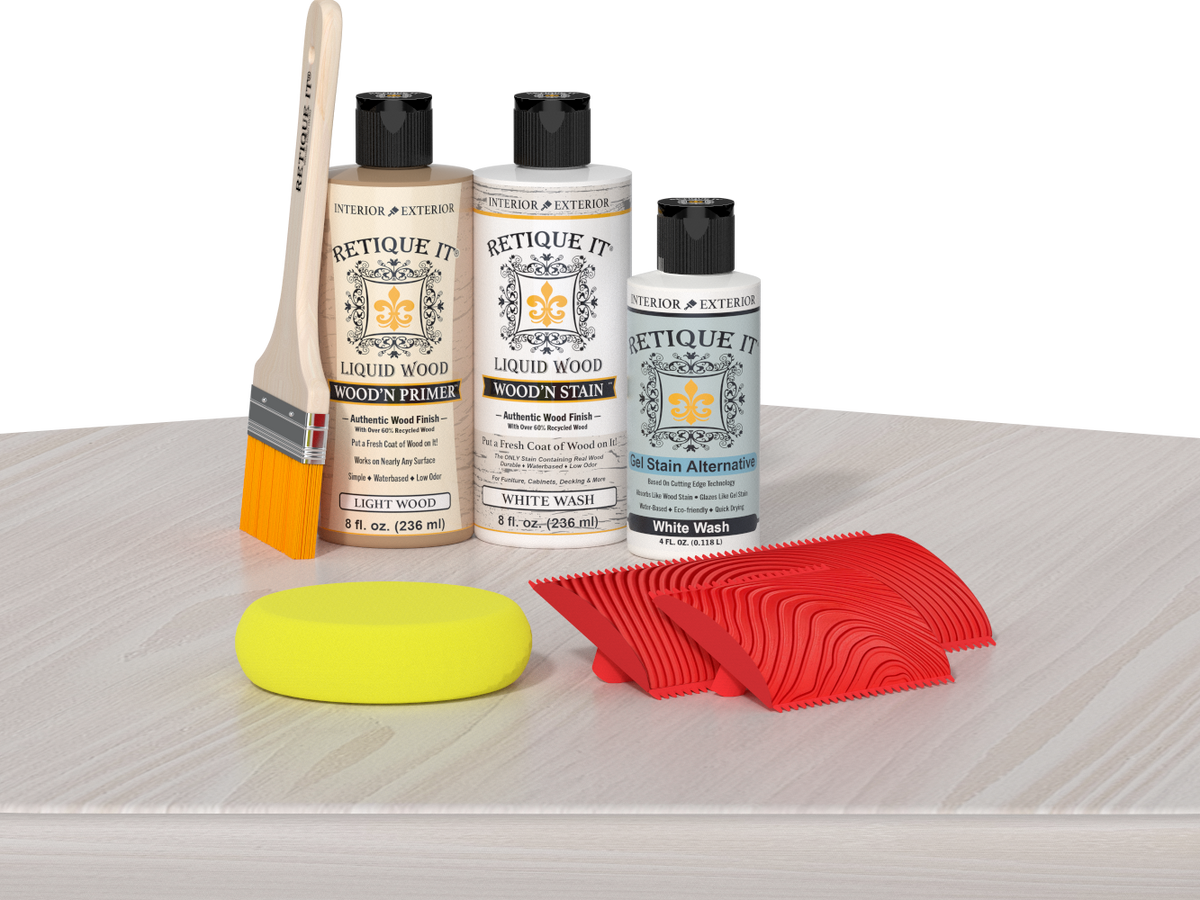 Retique It® Fireplace Mantel Wood'n Finish Kit in White Wash stain displayed on a table, showing natural wood grain and finish details.