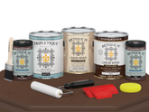 Retique It® Wood'n Finish Kit Java in matte, includes four large containers for interior wood top coating on a table.