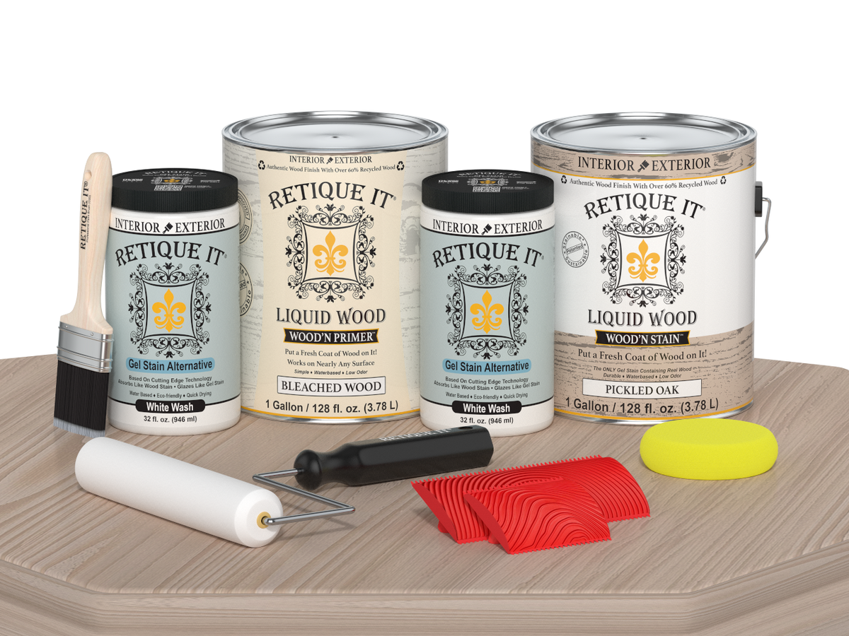 Sun-bleached Wood'n Finish Kit by Retique It® with four large wood finishing products on a table.