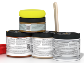 Five jars of paint with a yellow lid on a white background