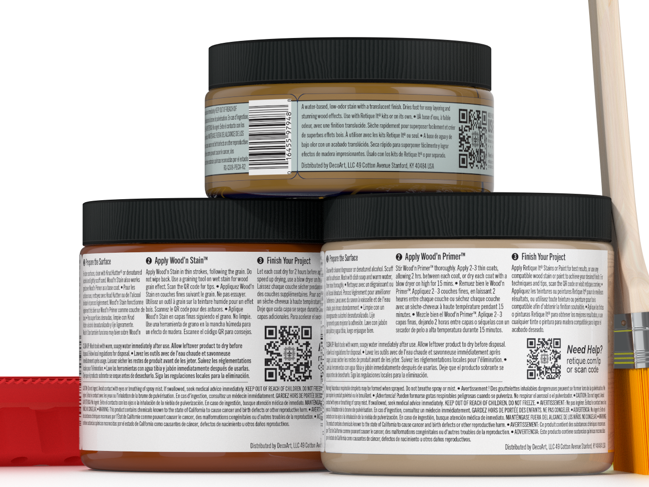 Three jars of wood finish product with labels and a brush on a white background