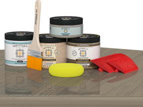 Retique It Wood'n Finish Kit in Drift Wood stain, double size, with wood sample and applicator on a table surface.