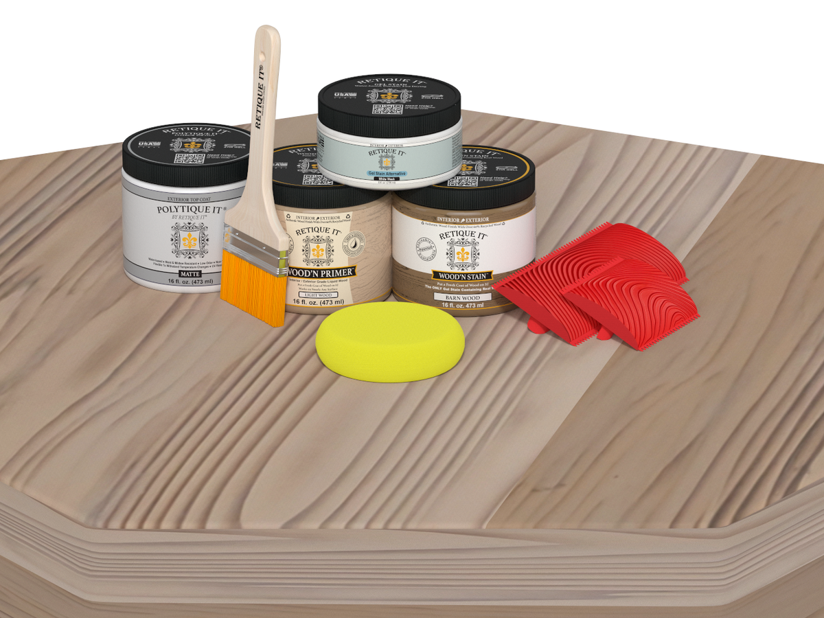Woodworking products including paint cans, a brush, and sponges on a wooden surface.