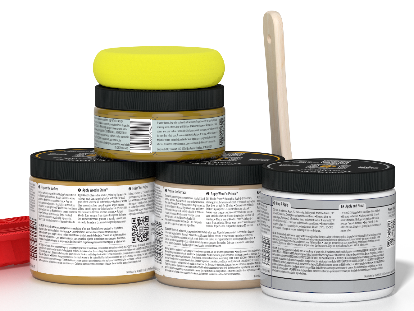 Four jars of a product with a yellow lid on top, a wooden tool beside them, on a white background.