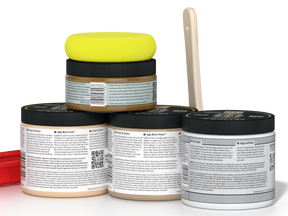 Five jars of paint with a yellow lid on a white background