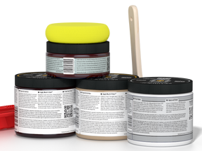 Four jars of paint with a yellow lid on a white background