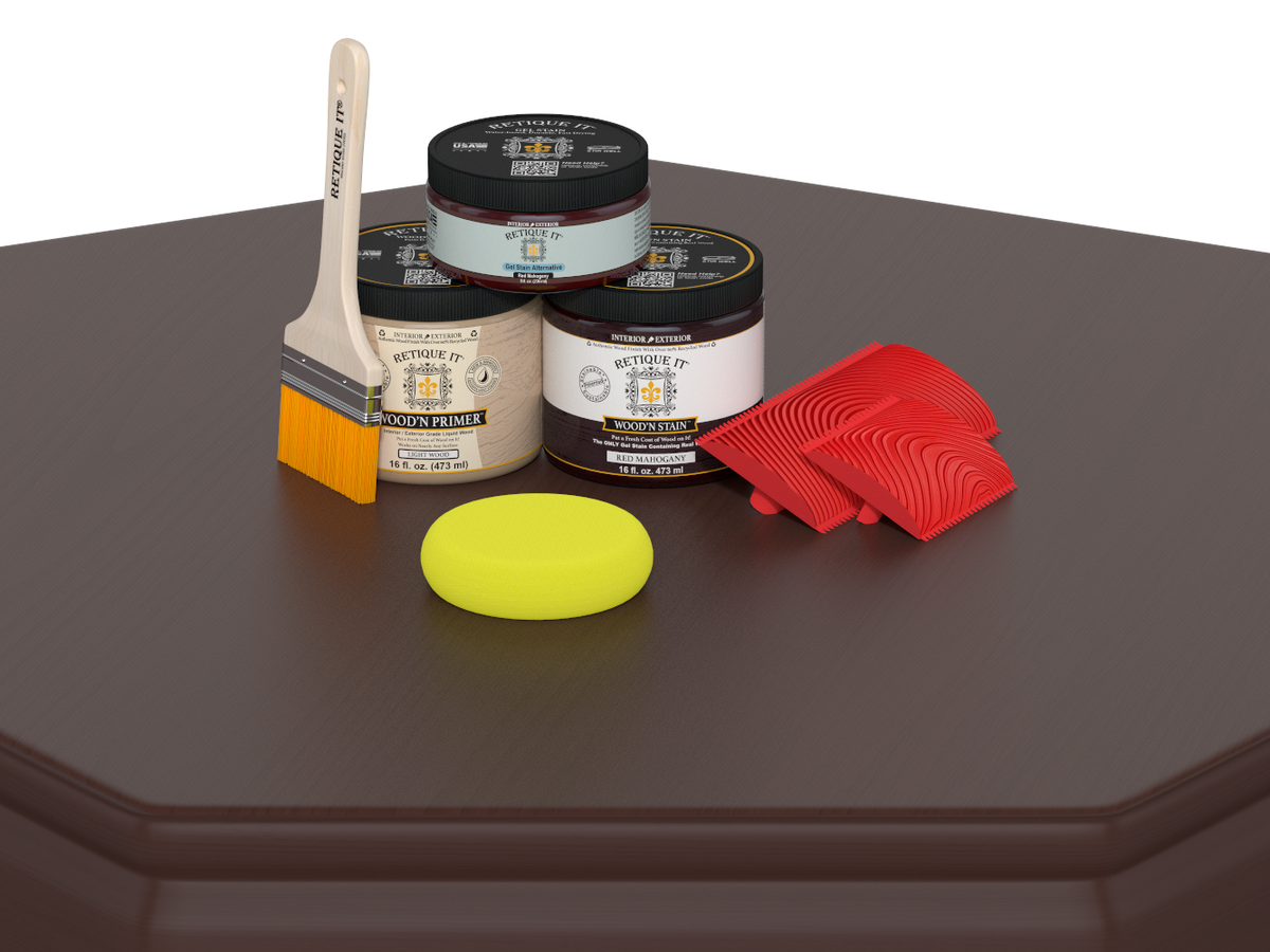 Painting supplies including cans, a brush, a sponge, and a tool on a brown surface.