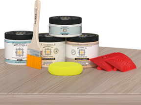 Sun-bleached Mid-sized Wood'n Finish Kit by Retique It® for interior top coating, featuring wood finish tools on a table.