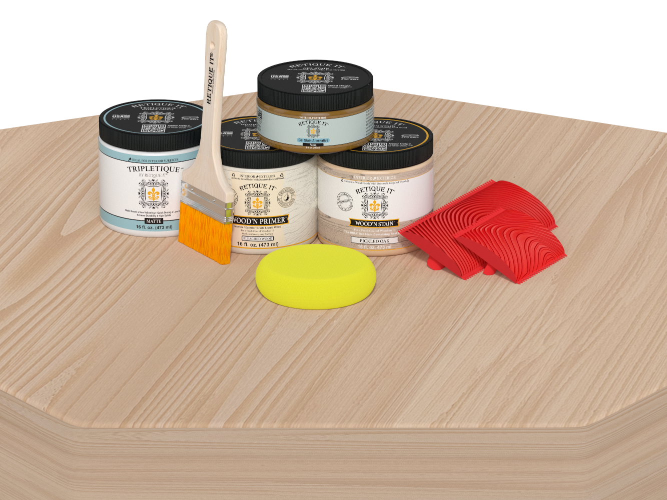 Painting supplies including cans, a brush, and sponges on a wooden surface.