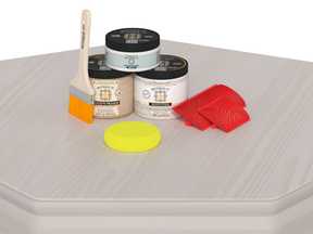 Retique It® Wood'n Finish Kit in White Wash for wood furniture, showing application tools and finished wood surface.