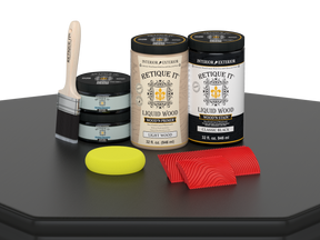 Large Black Wood'n Finish Kit by Retique It® on a table, showcasing multi-purpose wood finishing tools and supplies.