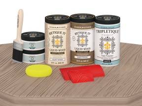 Retique It® French Oak countertop kit with matte stain applied on a kitchen table, showcasing natural wood grain and finish.