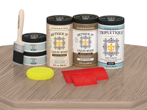 Retique It® French Oak countertop stain kit with satin finish on a kitchen countertop showing wood grain and stain application.