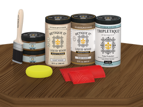 Retique It® Modern Walnut Wood Kit with primer, stains, satin topcoat, brush, roller, yellow sponge, and red graining tools.