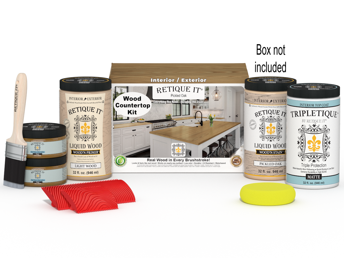 Retique It® Pickled Oak countertop kit showing stain application on a kitchen countertop with packaging box.