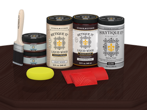 Retique It® Wood'n Finish front door kit in Red Mahogany stain with glossy finish, displayed on a table.