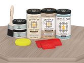 Retique It® Wood'n Finish Kit for full kitchen countertops in sun-bleached wood, matte finish, on a kitchen table.