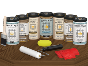 Retique It® Modern Walnut Wood Kit with primer, stains, matte topcoat, brush, roller, yellow sponge, and red graining tools.