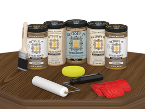 Retique It® Modern Walnut Wood Kit with primer, stains, brush, roller, yellow sponge, and red graining tools.