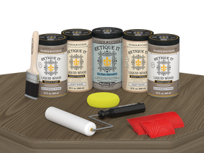 Retique It® Weathered Wood Kit with Liquid Wood®, Weathered Wood Gel Stain Alternative, yellow sponge, red graining tool, roller, and brush.