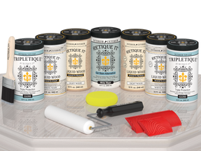 Retique It Wood'n Cabinet Kit with 24 grained white wash stain, glossy finish, displayed on a table.