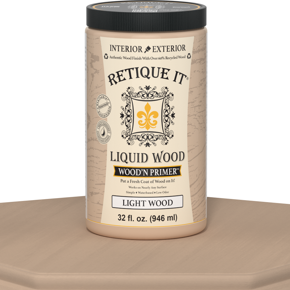 Retique It® Liquid Wood Wood'n Primer in Light Wood, 32 fl oz, showing a table with the primer applied on the surface.
