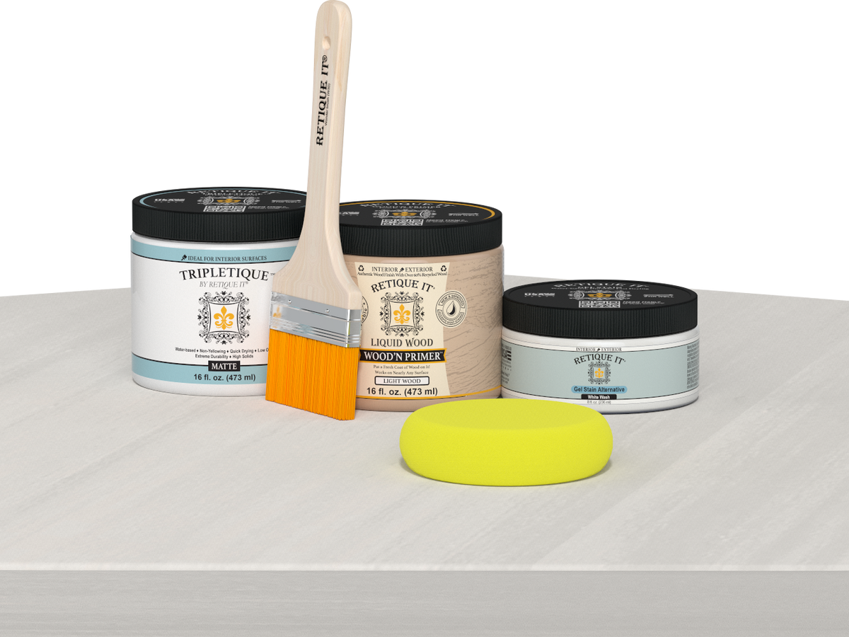 Retique It® Multi-purpose Smooth Finish Kit (Med) in White Wash for interior wood surfaces, featuring a matte top coat on a table.